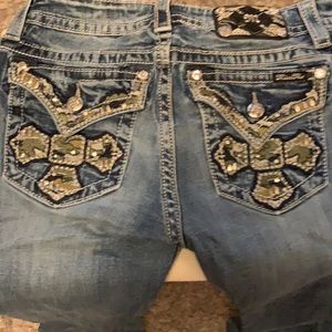 Miss Me Camo Cross pocket studded.